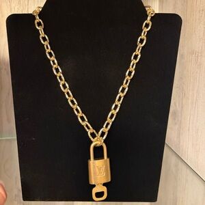 Louis Vuitton gold lock pendant and key with gold chain necklace